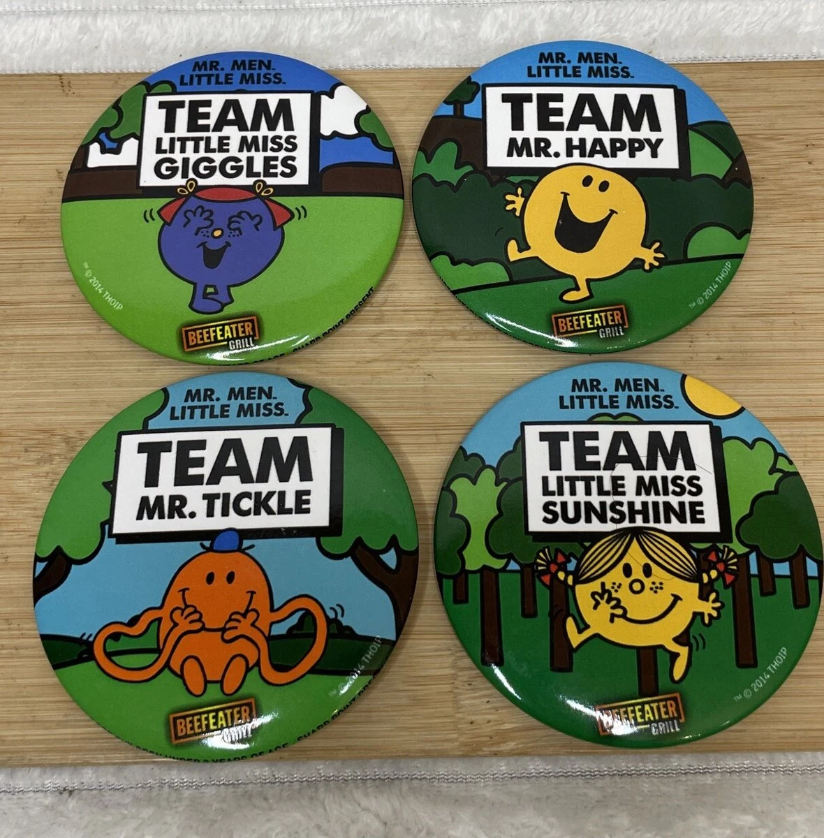 Team badges: Little Miss Giggles, Mr Happy, Mr Tickle, Little Miss Sunshine