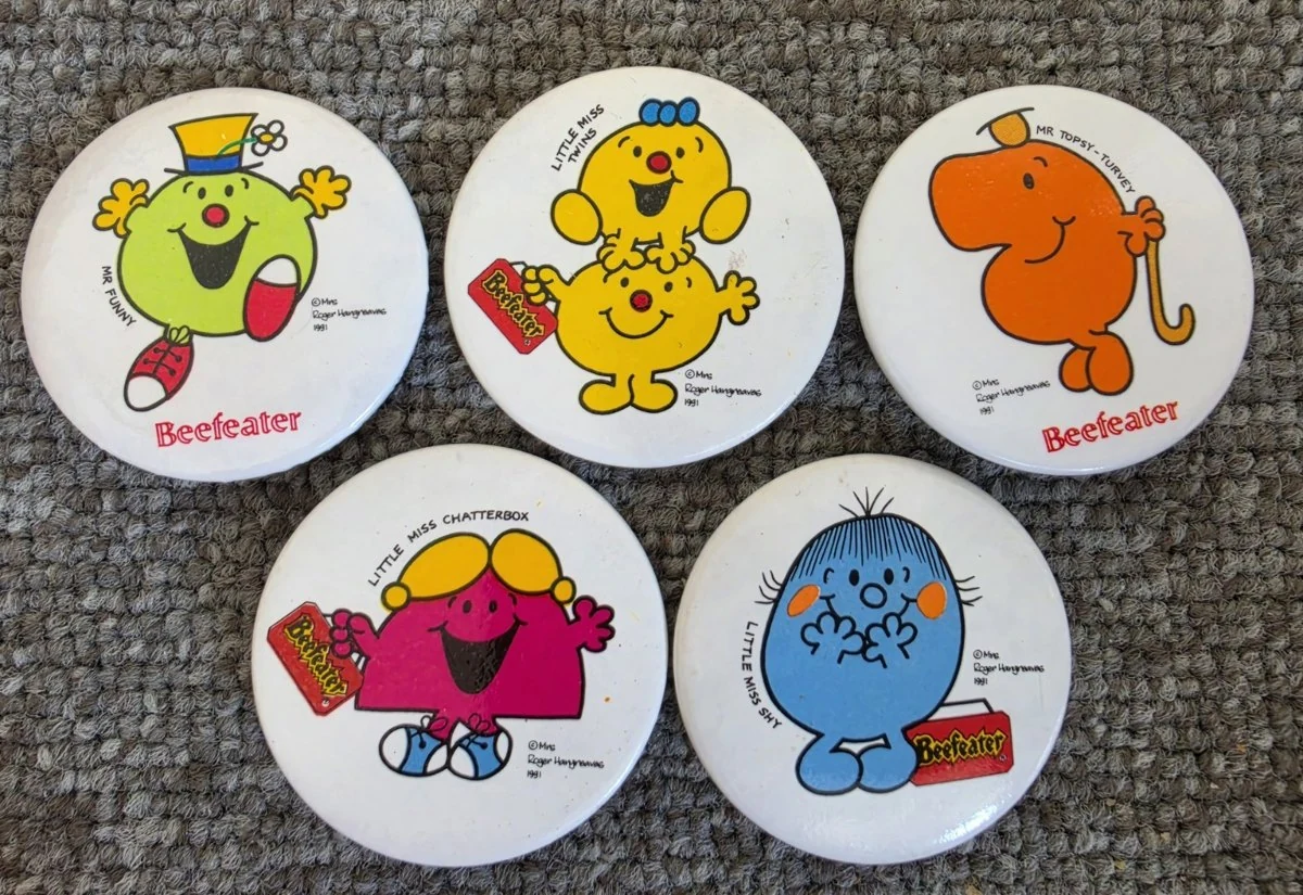 The 1991 set: Little Miss and Mr Men badges with the Beefeater name