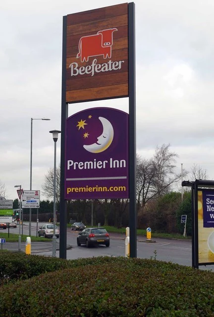 Sign for Beefeater public house and Premier Inn hotel, Finney Lane, Heald Green, near Stockport